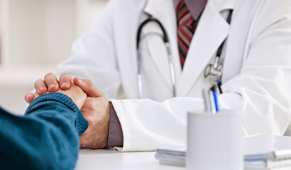 Photo of Doctor Discussing Stages of Cancer of the Pancreas